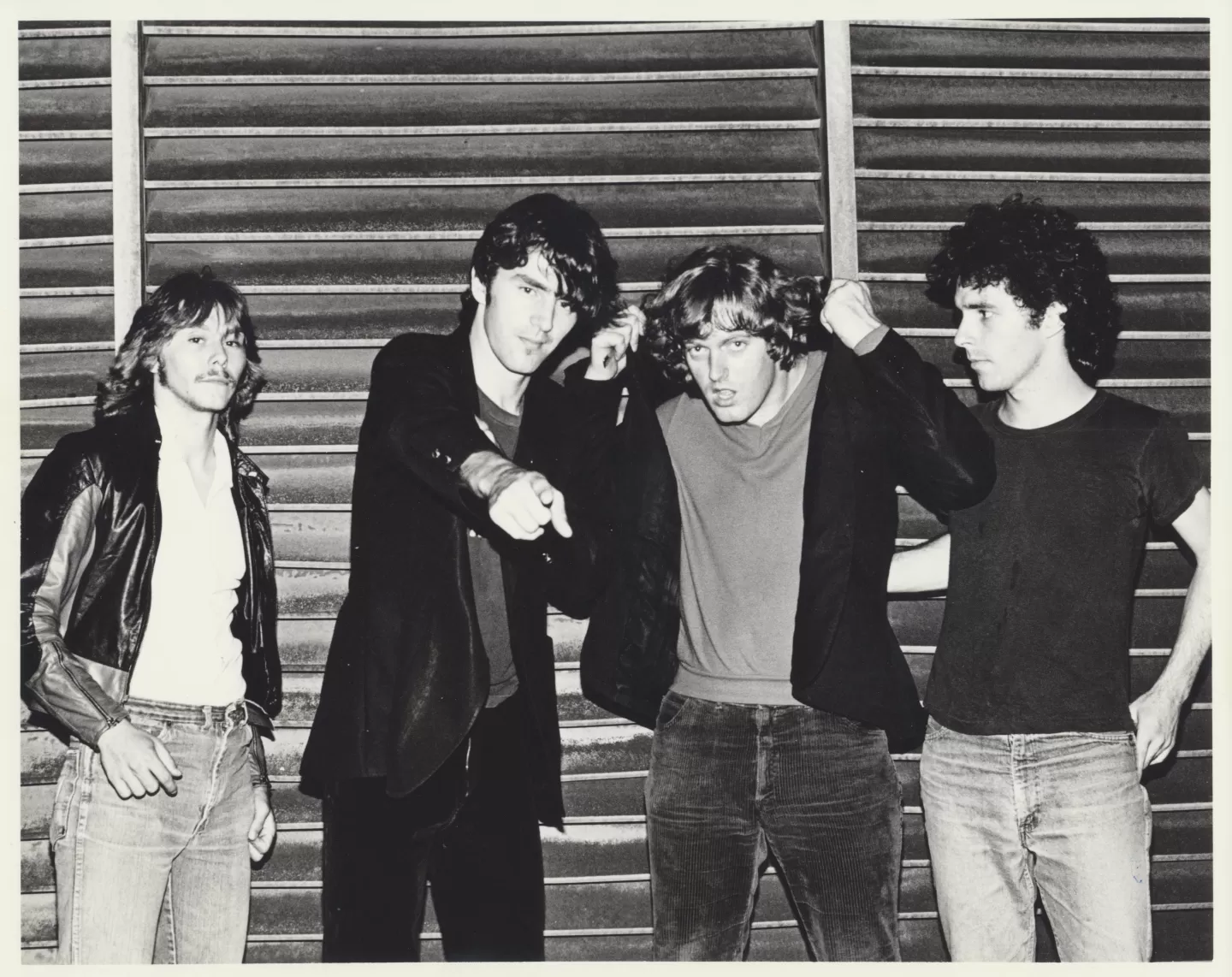 The Shakers together in an archival black and white band photograph